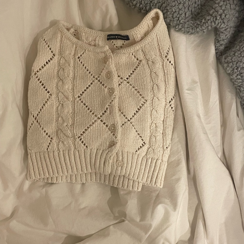 This is a brandy melville cropped sweater it is very soft and comfy